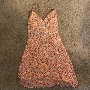 Pink flowery dress with open back NWT